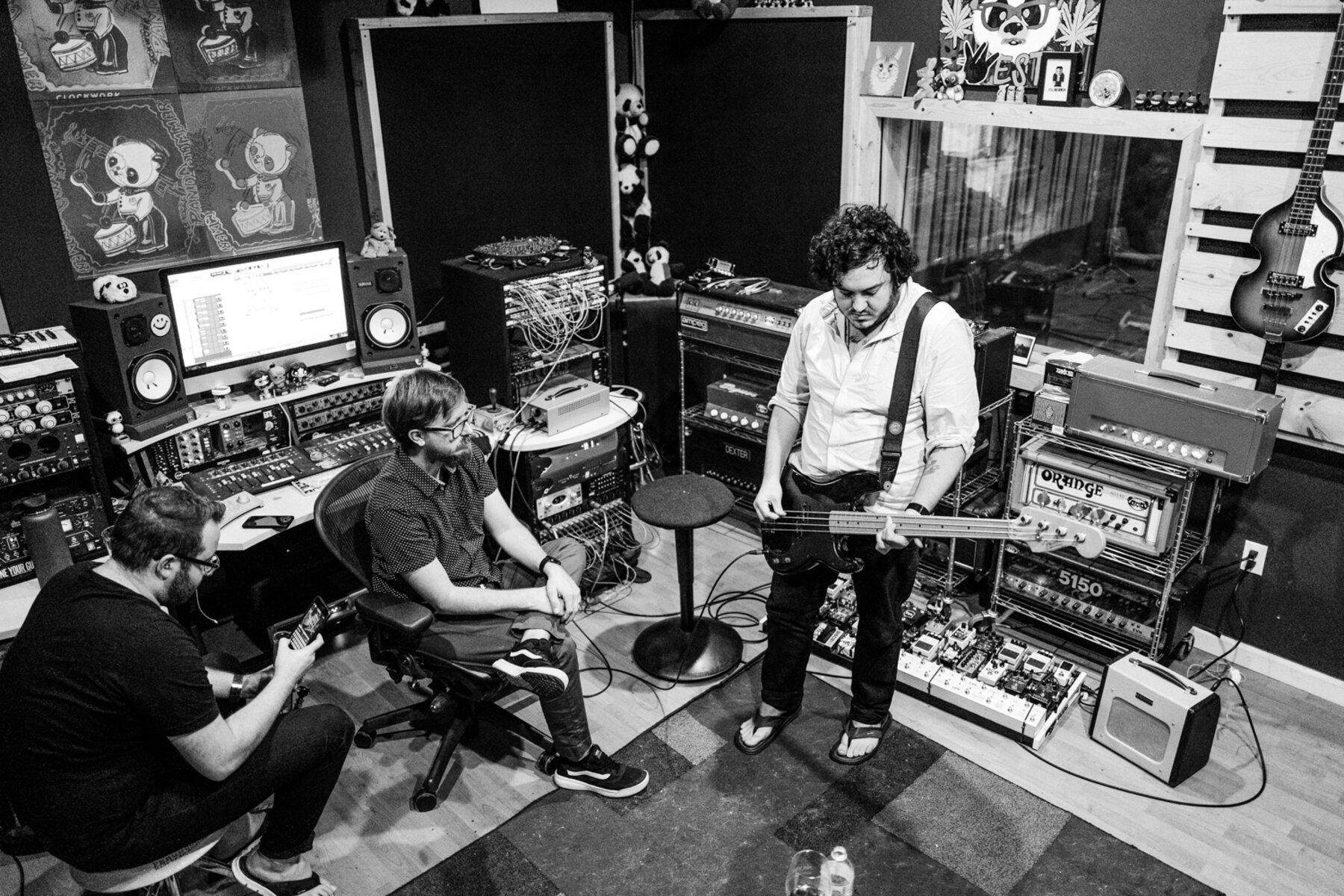 Listening back in the control room at The Panda Studios
