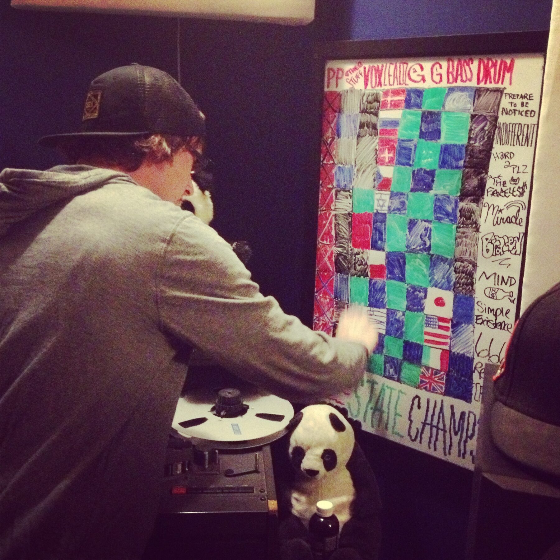 Working through the arrangement and tracking sheet on the whiteboard