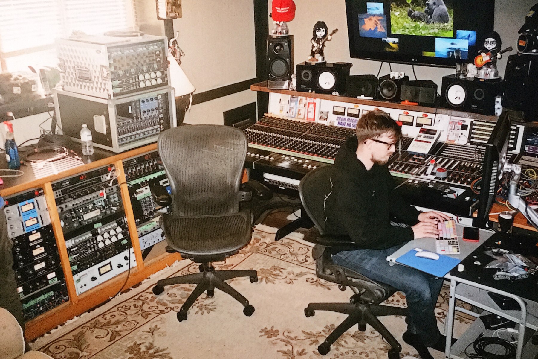 Sam Pura in the control room during Proper Dose sessions